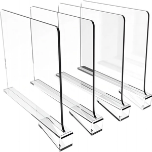 Set of 4 transparent acrylic shelf dividers for closet organization on white background