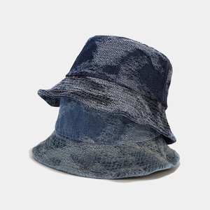 Detailed stacked view of deep and medium blue denim bucket hats with vintage stitching