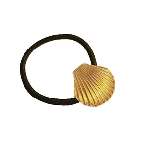 Minimalist elastic hair tie with a golden seashell charm and elegant metallic texture