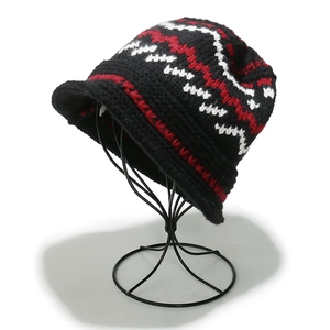 Fair Isle pattern knitted bucket hat in black with red and white zigzag wave design