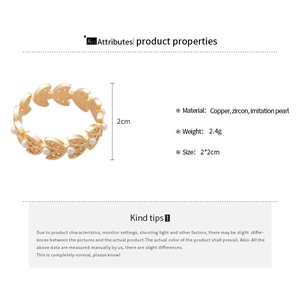 Detail of leaf design ring with zircons and pearls showing materials and dimensions