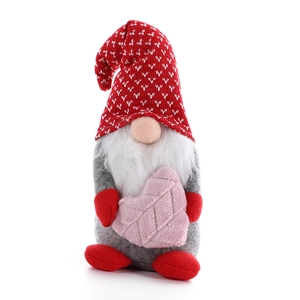 Handmade Christmas gnome plush with red heart hat and pink velvet heart decoration