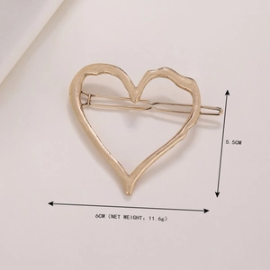 Golden hollow heart-shaped metal hair clip measuring 6cm by 5.5cm for women