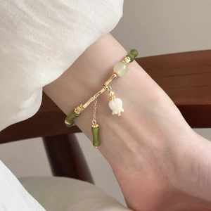 Elegant Neo-Chinese style bracelet with green beads, bamboo joints and lily of the valley