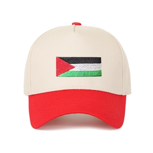 Detailed embroidery of the Palestine flag on a two-tone red and white baseball cap