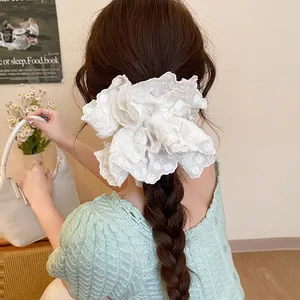 White double-layer lace scrunchie with floral embroidery for elegant hairstyles