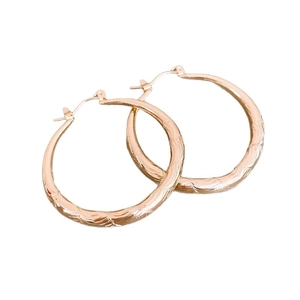 Elegant rose gold round stud earrings with textured wavy patterns and secure back closure