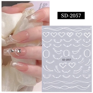 Autocollants d'ongles 5D gaufrés avec perles blanches élégantes motifs cœurs et vagues