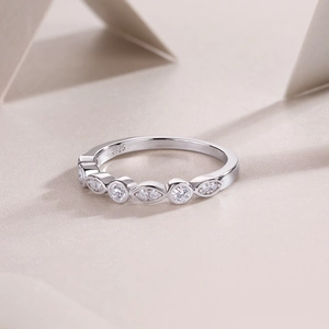 Detailed macro view of S925 sterling silver ring with marquise and round cut cubic zirconia