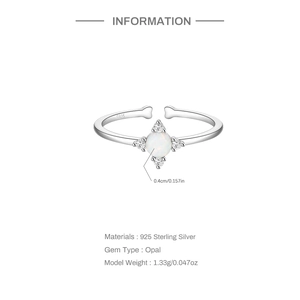 Detailed macro view of S925 sterling silver ring with opal stone and accent diamonds