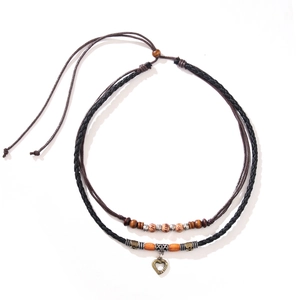 Bohemian double-layer necklace with wooden beads and bronze heart pendant on white background
