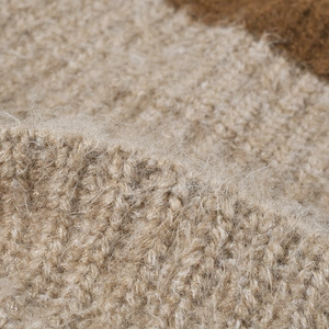 Thick wool knit beanie in oatmeal and dark brown contrast with fuzzy texture detail