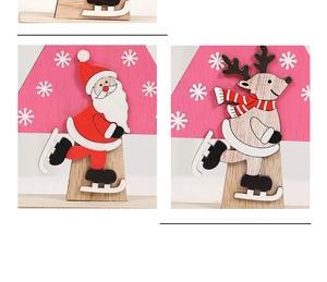 Detail of wooden Christmas ornaments featuring Santa and reindeer designs in festive pink