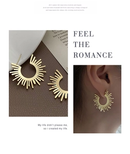 Detail showing golden sunflower fan earrings with both flat lay and model-worn views