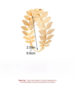 Detailed dimensions of a 6.6cm gold leaf arm cuff made of polished iron metal