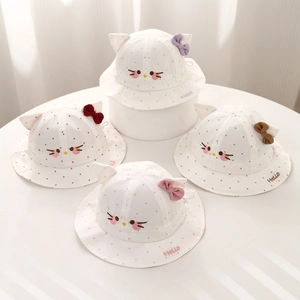 Polka dot baby sun hat with cat ears and bow detail in multiple colors for spring