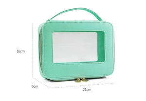Detail view of light green PU leather makeup bag with dimensions 16x6x21cm and clear window