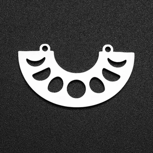 Detailed view of silver stainless steel crescent moon jewelry charms for DIY projects