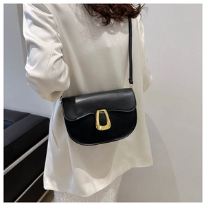 Chic black semi-circle saddle bag with gold metal buckle and long shoulder strap