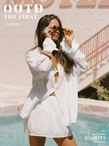 Detailed texture of white crinkled cotton-linen shirt and shorts two-piece set