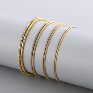 Polished gold stainless steel round snake bone chains in four different thicknesses
