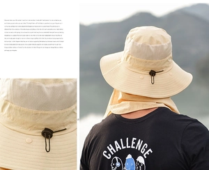 Detail of beige outdoor sun hat showing breathable mesh and adjustable toggle drawcord