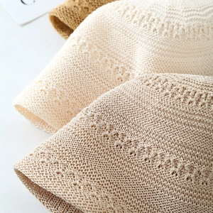 Detailed close-up showing the premium knit texture and colors of wool bucket hats