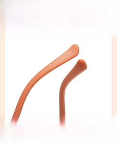 Detail of ergonomic curved non-slip temples on brown round children sunglasses