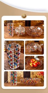 Detailed set of mosaic glass vase, candy jar, and fruit plate on a wooden table