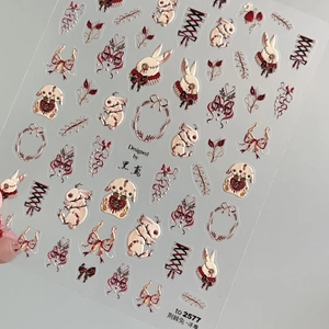 Macro view of gothic rabbit relief nail stickers with thorn and bow texture details