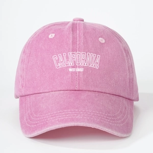 Close-up of pink washed cotton baseball cap with CALIFORNIA WEST COAST embroidery