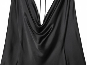 Close-up of elegant cowl neck detail on black satin dress with silky smooth texture