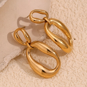 French style 18K gold plated stainless steel geometric earrings on white artistic stone