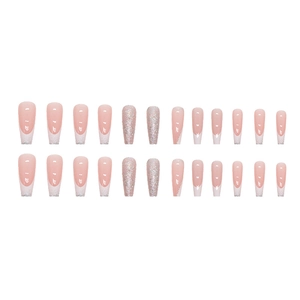 Long ballerina press-on nails in white French tip style with silver glitter accents