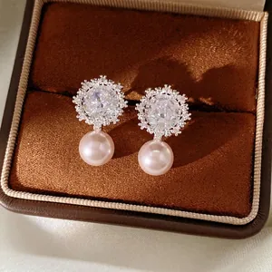 Elegant silver flower pearl earrings with square cubic zirconia in a jewelry gift box