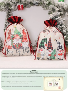 Christmas gnome drawstring gift bags with classic red plaid edges and festive Joy graphics