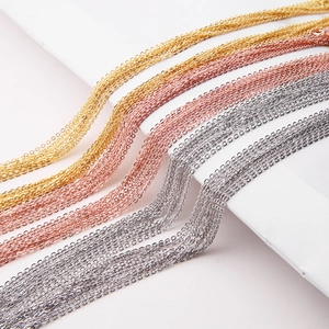Close-up of S925 sterling silver O-chains in gold, rose gold and silver finishes