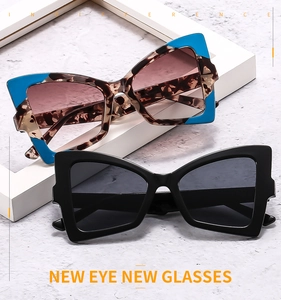 Detail view of butterfly cat eye sunglasses in tortoiseshell blue and matte black