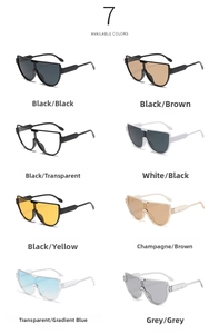 Multiple color variations of oversized wrap-around sunglasses with wide temples