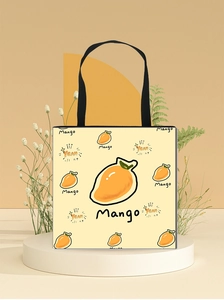 Detail of canvas mango tote bag showing large capacity and black shoulder strap