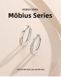 Detail of S925 silver Mobius rings showing twisted design and sparkling zircon inlays