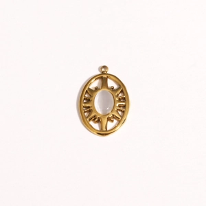 Detailed view of a vintage gold steel sun pendant with opal stone and radiant rays