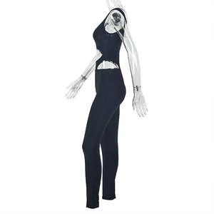 Detail view of the side cutout design on a black slim fit backless athletic bodysuit