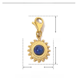 Detail view of gold sun pendant with blue stone showing 25mm height and 11mm width