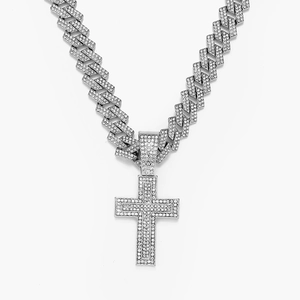 Hip hop silver Cuban link chain necklace with a large iced-out diamond cross pendant