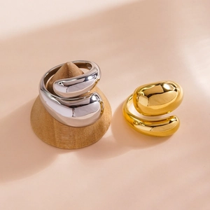 Minimalist liquid metal style double waterdrop rings in 14K gold and silver finishes