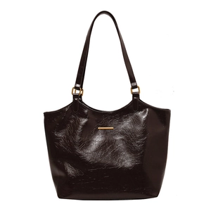 Classic dark brown soft leather tote bag with glossy finish and gold metal accents