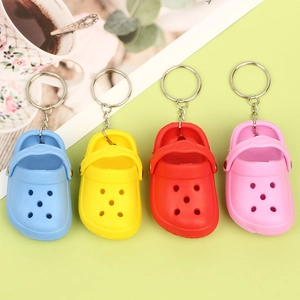 Miniature colorful clog shoe keychains in blue, yellow, red and pink with metal rings