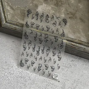 3D embossed nail stickers featuring black vintage vine and floral scroll patterns