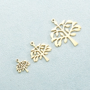 Rose gold stainless steel tree of life pendants in three sizes on a light blue background